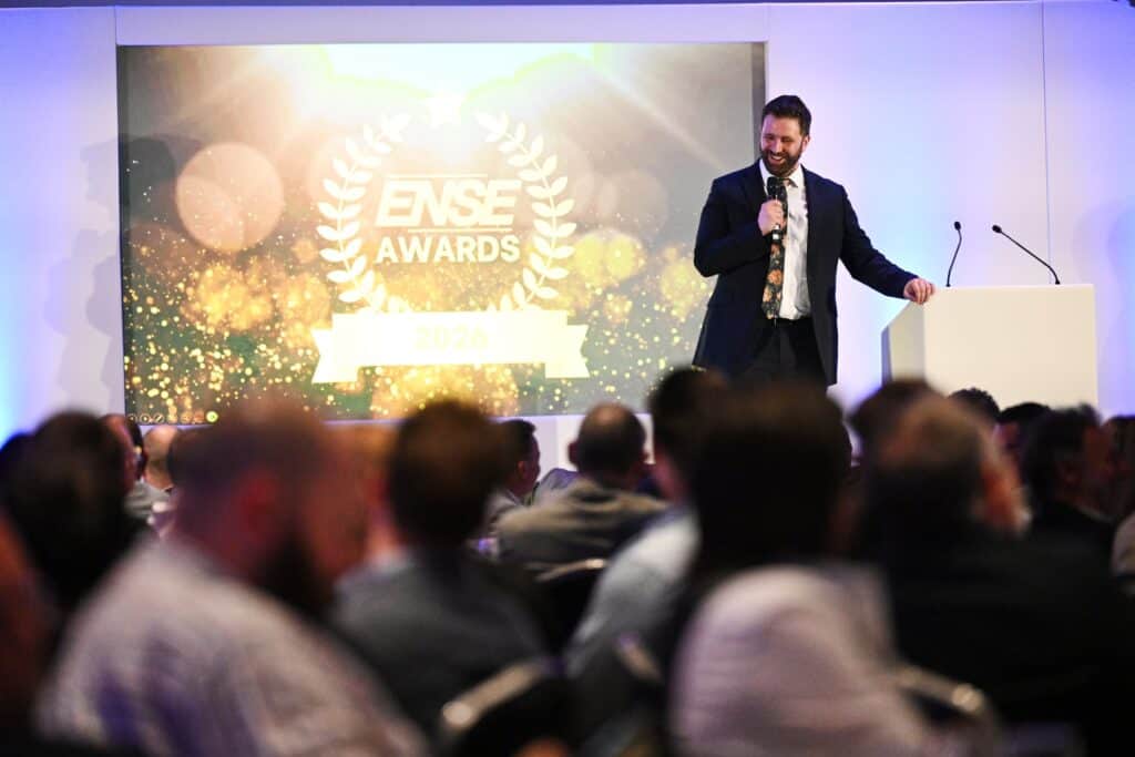 Pierre Novellie, an acclaimed stand-up comedian, writer, radio host, and podcaster, addressing the crowd at the 2026 ENSE Partnership Summit & Awards.
