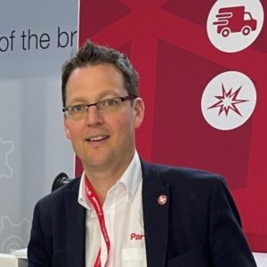 A headshot of Julian Fisher, Head of Marketing at Parts Town UK